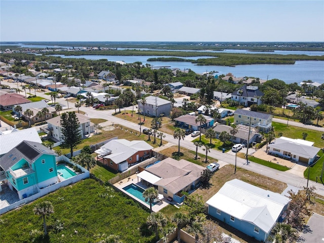 aerial view with a water view and a residential view