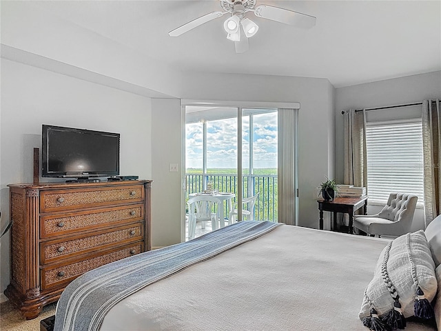 bedroom with a ceiling fan and access to exterior