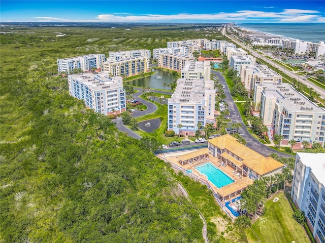 drone / aerial view with a water view