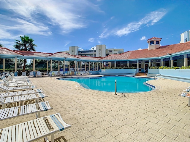 community pool with a patio