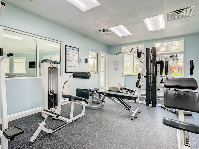 workout area with baseboards and visible vents
