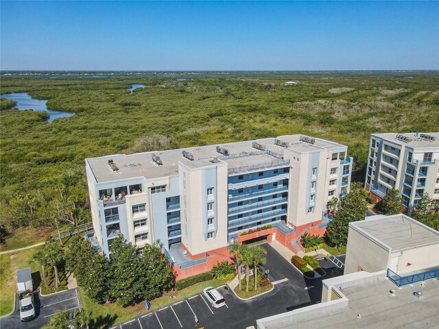 5300 S Atlantic Ave Unit 10-205, New Smyrna Beach, FL 32169 - birds eye view of property with a water view and a forest view