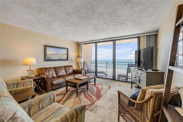 4139 S Atlantic Ave Unit A504, New Smyrna Beach, FL 32169 - living area featuring a wall of windows