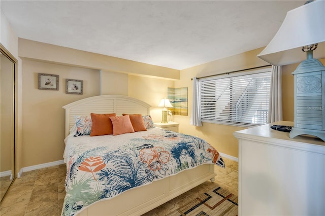 4139 S Atlantic Ave Unit A504, New Smyrna Beach, FL 32169 - bedroom featuring baseboards