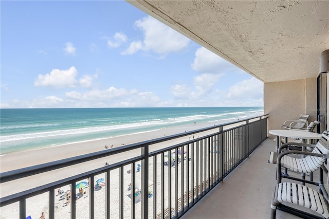 4139 S Atlantic Ave Unit A504, New Smyrna Beach, FL 32169 - balcony featuring a beach view and a water view