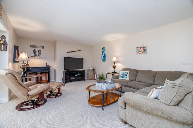 4150 S Atlantic Ave Unit 115D, New Smyrna Beach, FL 32169 - living room with baseboards and carpet