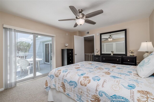 4150 S Atlantic Ave Unit 115D, New Smyrna Beach, FL 32169 - carpeted bedroom featuring access to exterior, a ceiling fan, and visible vents