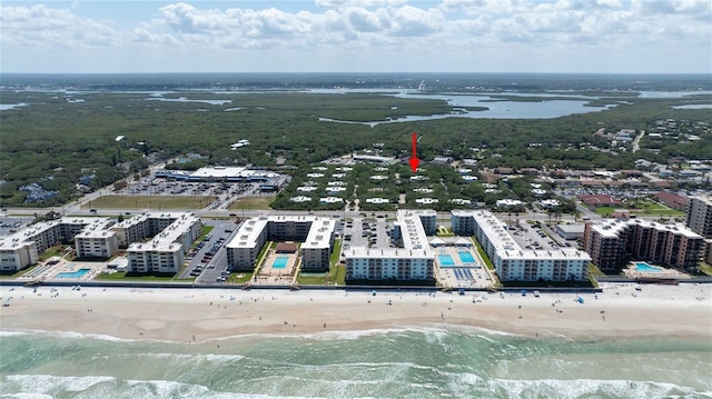 4150 S Atlantic Ave Unit 115D, New Smyrna Beach, FL 32169 - drone / aerial view with a view of the beach and a water view