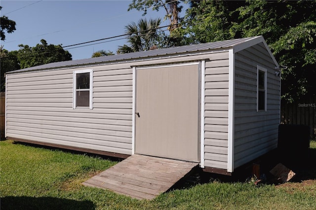 2204 Kumquat Dr, Edgewater, FL 32141 - view of shed featuring fence