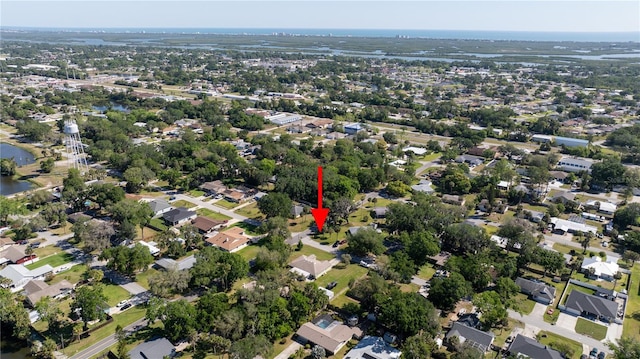 2204 Kumquat Dr, Edgewater, FL 32141 - drone / aerial view featuring a water view and a residential view