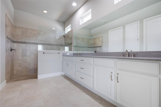 6277 W Fallsgrove Ln, Port Orange, FL 32128 - bathroom with walk in shower, double vanity, a sink, and recessed lighting