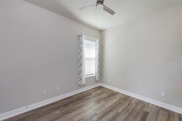 6277 W Fallsgrove Ln, Port Orange, FL 32128 - unfurnished room with ceiling fan, baseboards, and wood finished floors