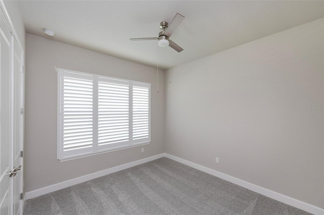 6277 W Fallsgrove Ln, Port Orange, FL 32128 - carpeted empty room featuring baseboards and a ceiling fan