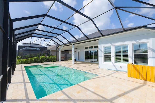 6277 W Fallsgrove Ln, Port Orange, FL 32128 - outdoor pool with a patio, a ceiling fan, and glass enclosure