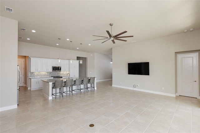 6277 W Fallsgrove Ln, Port Orange, FL 32128 - living area with light tile patterned flooring, visible vents, a ceiling fan, and recessed lighting