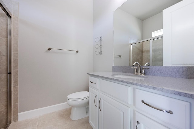 6277 W Fallsgrove Ln, Port Orange, FL 32128 - full bathroom with a stall shower, baseboards, toilet, tile patterned floors, and vanity