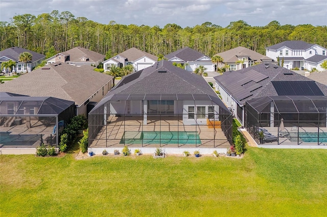 6277 W Fallsgrove Ln, Port Orange, FL 32128 - exterior space with a yard, a residential view, an outdoor pool, and a patio area