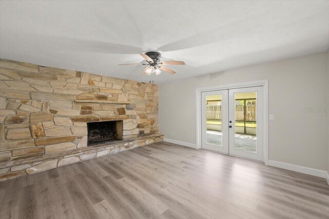 3644 Dame St, Port Orange, FL 32129 - unfurnished living room featuring wood finished floors, baseboards, a ceiling fan, and french doors