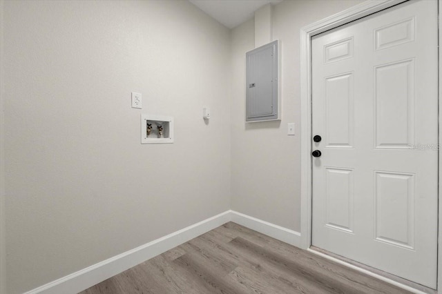 3644 Dame St, Port Orange, FL 32129 - washroom featuring hookup for a washing machine, light wood-style floors, electric panel, baseboards, and laundry area