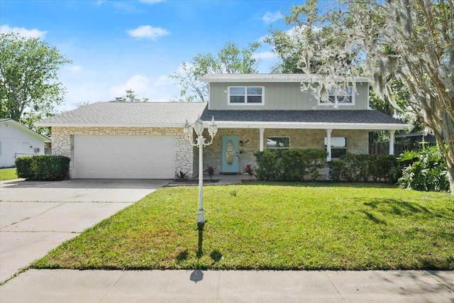 3644 Dame St, Port Orange, FL 32129 - traditional-style house with concrete driveway, stone siding, a front yard, and a garage