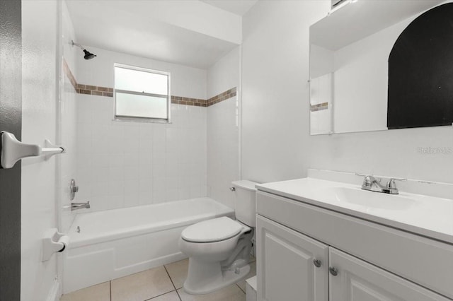 bathroom featuring toilet, vanity, bathtub / shower combination, and tile patterned floors