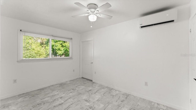 557 Berkshire Rd, Daytona Beach, FL 32114 - spare room with baseboards, a ceiling fan, an AC wall unit, and marble finish floor