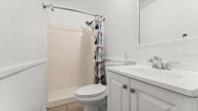 557 Berkshire Rd, Daytona Beach, FL 32114 - full bathroom with vanity, tile patterned flooring, a shower stall, and toilet