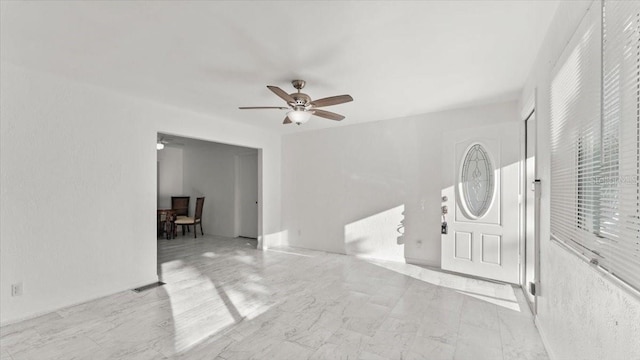 557 Berkshire Rd, Daytona Beach, FL 32114 - empty room featuring a ceiling fan and visible vents