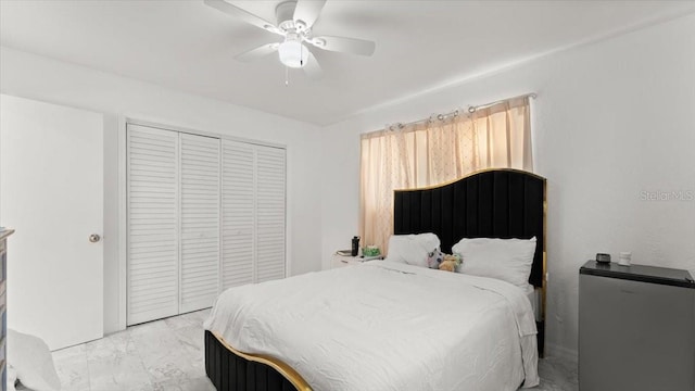 557 Berkshire Rd, Daytona Beach, FL 32114 - bedroom with a closet, marble finish floor, and ceiling fan