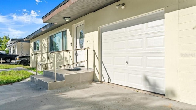 557 Berkshire Rd, Daytona Beach, FL 32114 - property entrance with concrete block siding