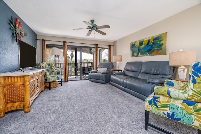 living area with light carpet and a ceiling fan