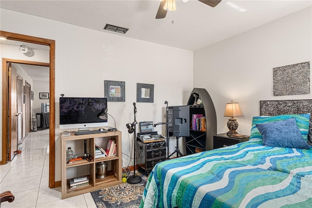 109 Shangri La Cir, Edgewater, FL 32132 - bedroom with a ceiling fan, tile patterned floors, and visible vents