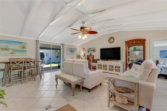 living room with a ceiling fan, lofted ceiling with beams, and tile patterned flooring