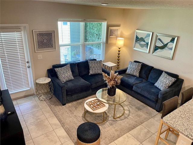 living room with light tile patterned flooring