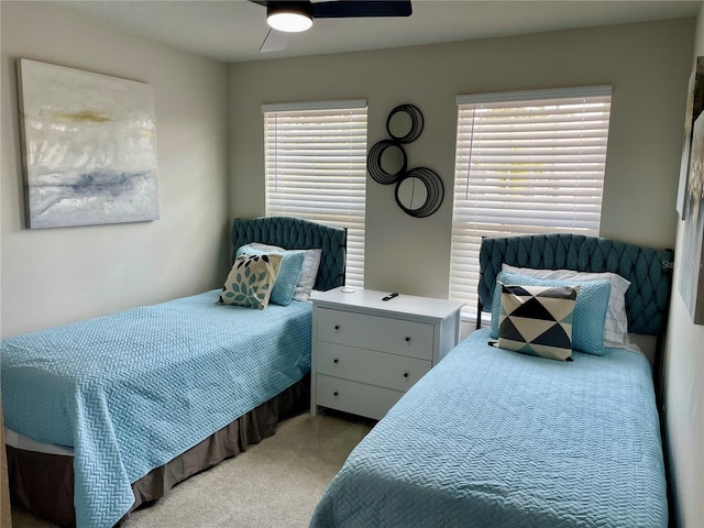 bedroom with carpet floors and a ceiling fan