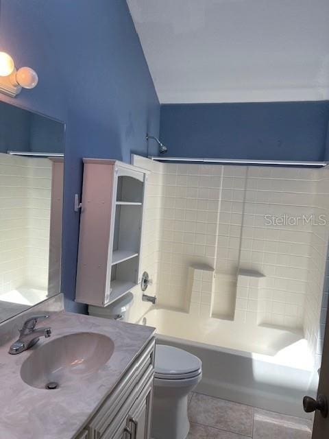 2091 Maltese Ln, New Smyrna Beach, FL 32168 - full bath featuring tile patterned flooring, vanity, bathtub / shower combination, and toilet