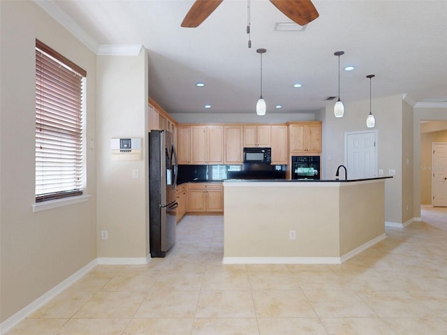 kitchen featuring freestanding refrigerator, a ceiling fan, black microwave, and light brown cabinets