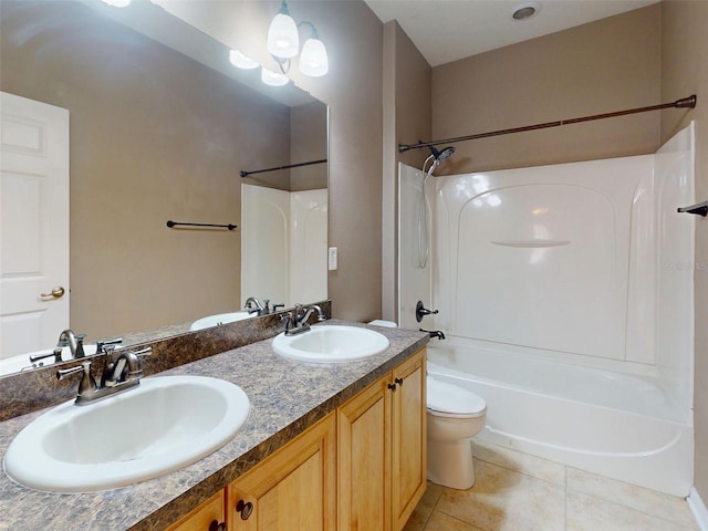 full bath with tile patterned flooring, a sink, shower / bathing tub combination, and toilet