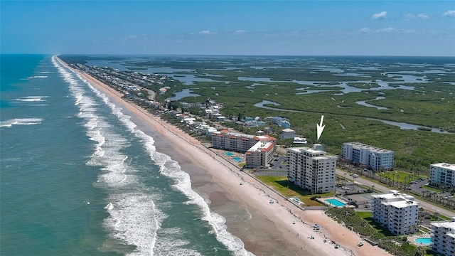 5499 Atlantic Unit 104, New Smyrna Beach, FL 32169 - aerial view featuring a beach view and a water view