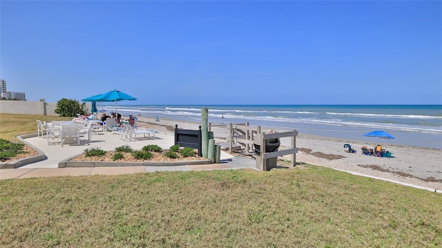 5499 Atlantic Unit 104, New Smyrna Beach, FL 32169 - water view featuring a view of the beach