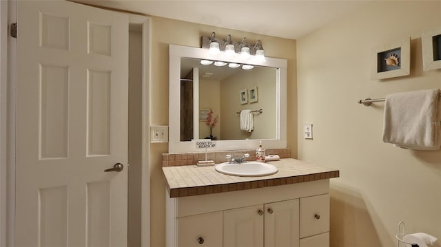 5499 Atlantic Unit 104, New Smyrna Beach, FL 32169 - bathroom with vanity