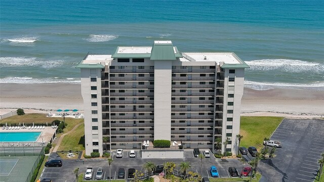 5499 Atlantic Unit 104, New Smyrna Beach, FL 32169 - aerial view featuring a beach view and a water view