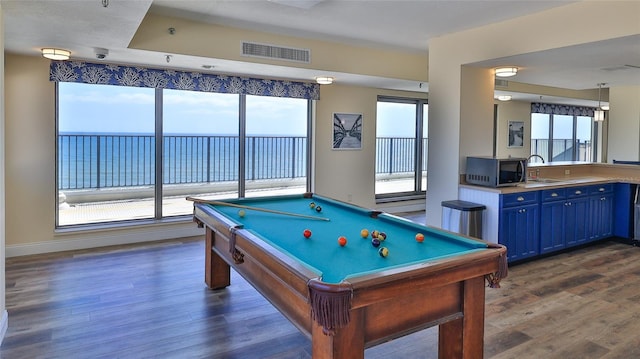 5499 Atlantic Unit 104, New Smyrna Beach, FL 32169 - playroom featuring visible vents, dark wood-style flooring, pool table, and a sink