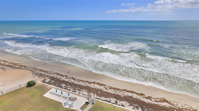 5499 Atlantic Unit 104, New Smyrna Beach, FL 32169 - bird's eye view featuring a water view and a beach view