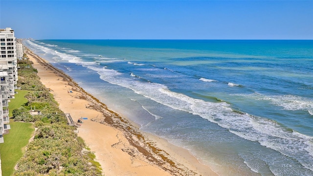 5499 Atlantic Unit 104, New Smyrna Beach, FL 32169 - property view of water with a view of the beach