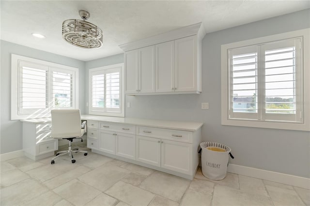 6260 S Atlantic Ave, New Smyrna Beach, FL 32169 - office space with built in desk and baseboards