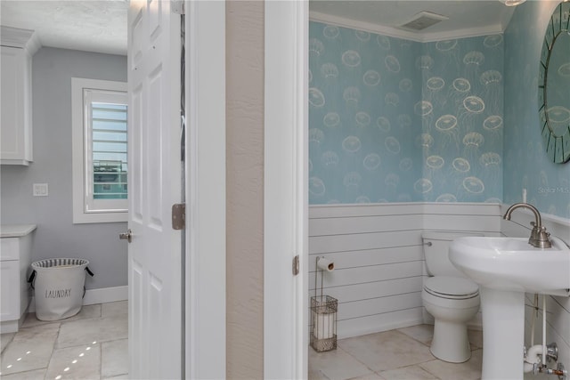 6260 S Atlantic Ave, New Smyrna Beach, FL 32169 - bathroom featuring toilet and tile patterned floors
