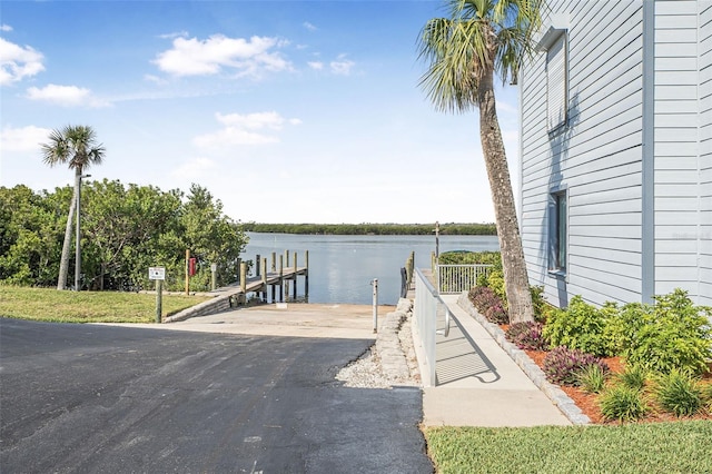 dock area featuring a water view