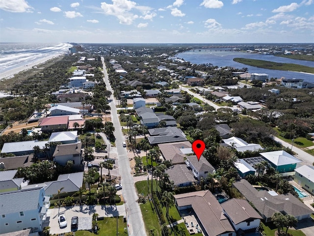 aerial view featuring a residential view and a water view