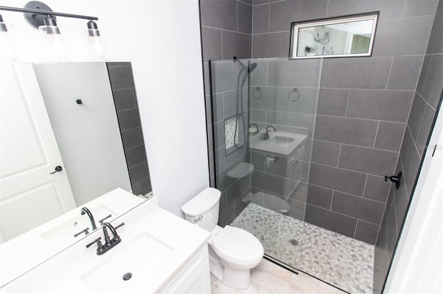 full bath with walk in shower, toilet, and vanity